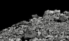 NASA spacecraft observing asteroid Bennu rocks