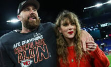 travis kelce and taylor swift embracing on field