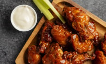 wings on a wooden platter