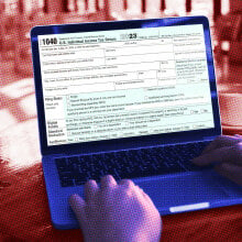 A person filling out tax forms online.