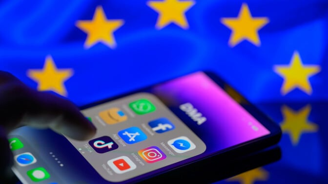 TikTok app on phone screen with the EU flag in the background.