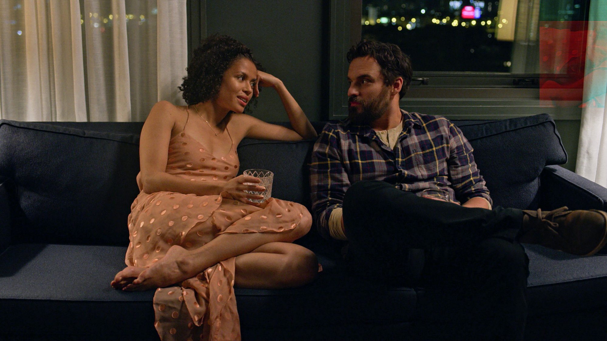 A scene from "Easy" Season 3: couple on a couch