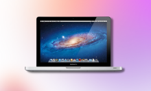 2015 Apple MacBook Pro with pink gradient background