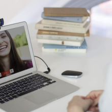 two people conducting a video call using a logitech webcam