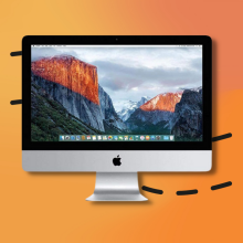 refurbished imac desktop computer with orange gradient background with black arrows