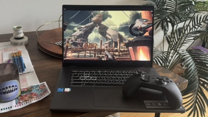 the Acer Chromebook 516 GE with an xbox controller resting on it on a kitchen table